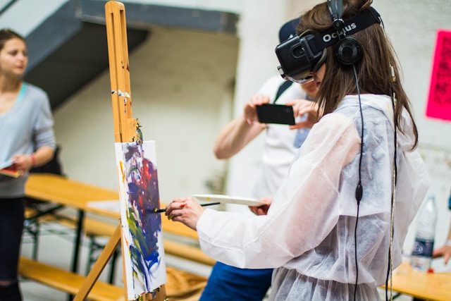 girl painting using a virtual reality visor